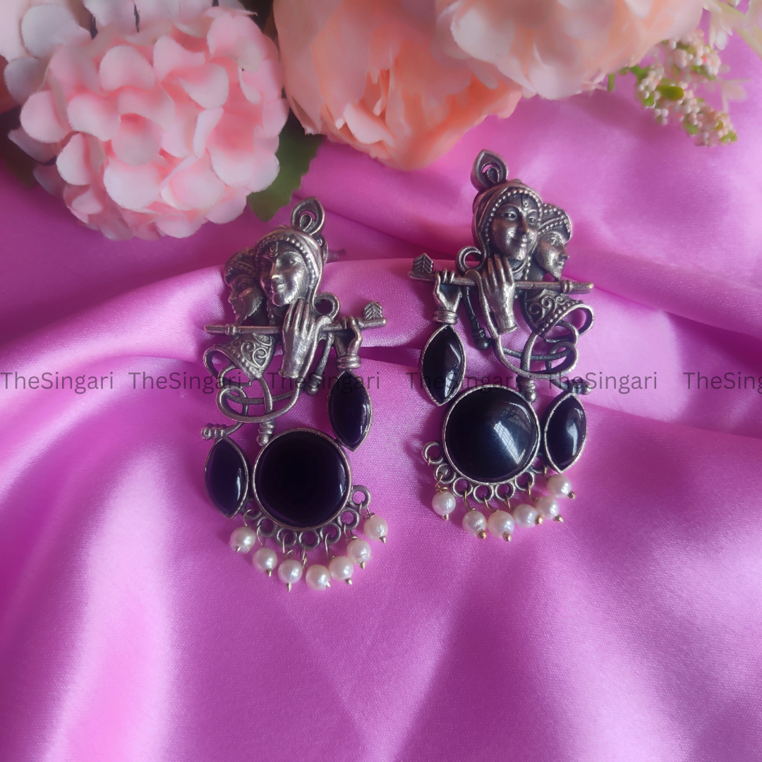 Radha Krishna Silver Brass based earrings in Black