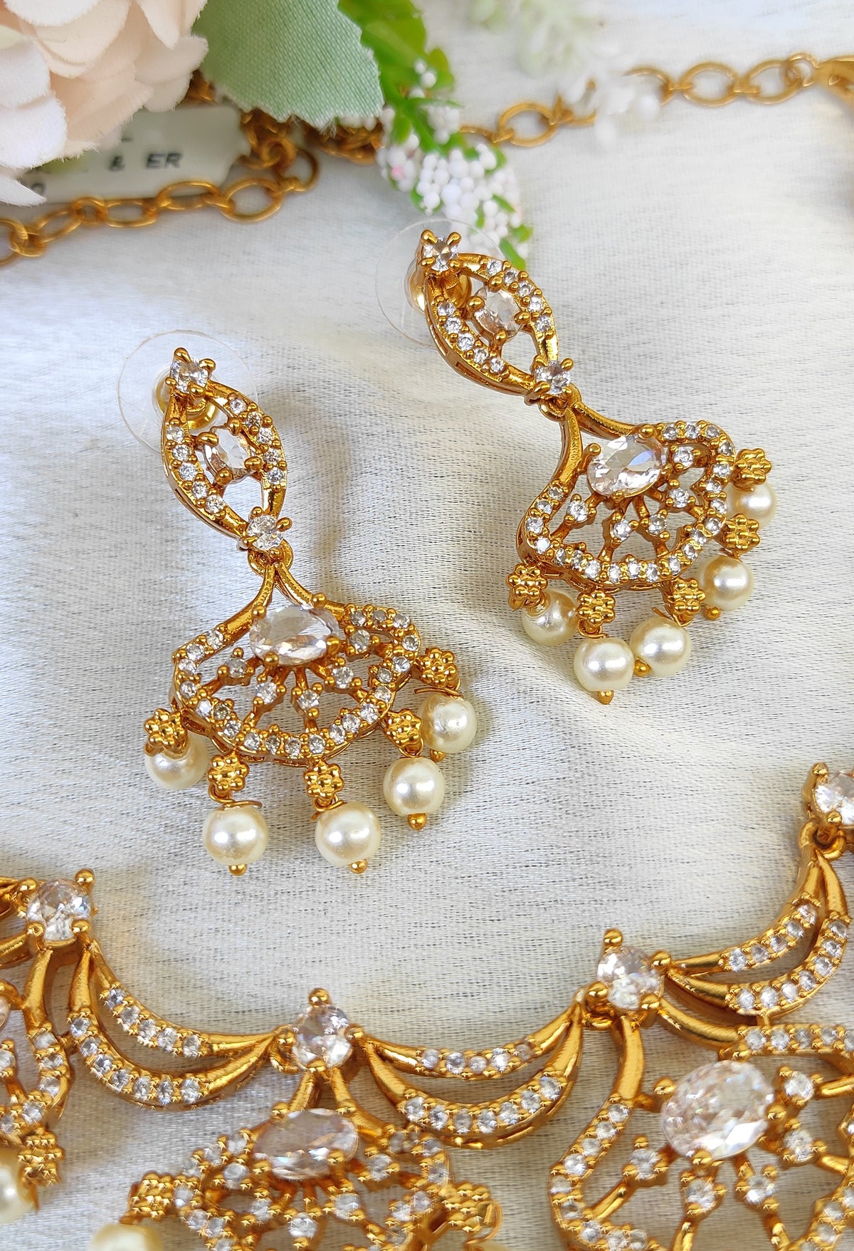 Designer necklace with earrings in White colour