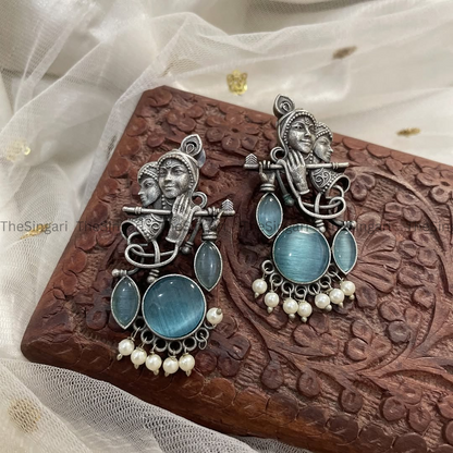 Radha Krishna Silver Brass based earrings in Blue