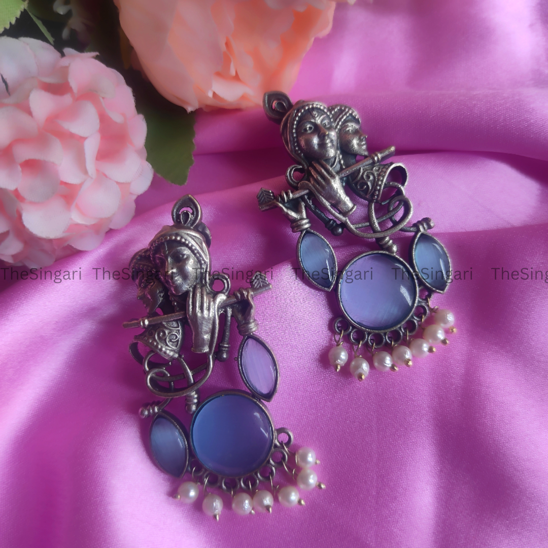 Radha Krishna Silver Brass based earrings in Blue
