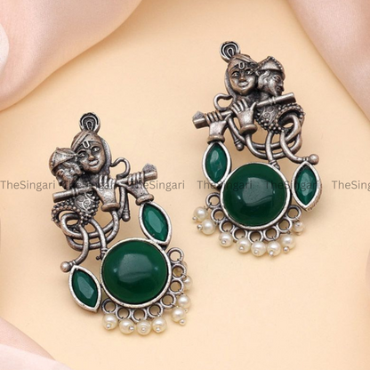 Radha Krishna Silver Brass based earrings in Green