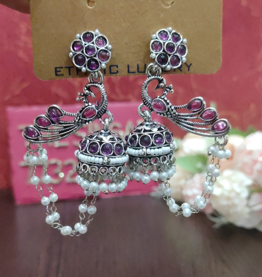 Silver-Plated Purple Stone Peacock motif Jhumka Earrings with Double Pearl Chains