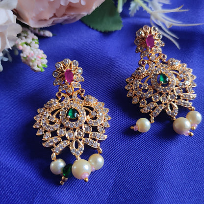 Peacock AD stone earrings pearl layered center green stone