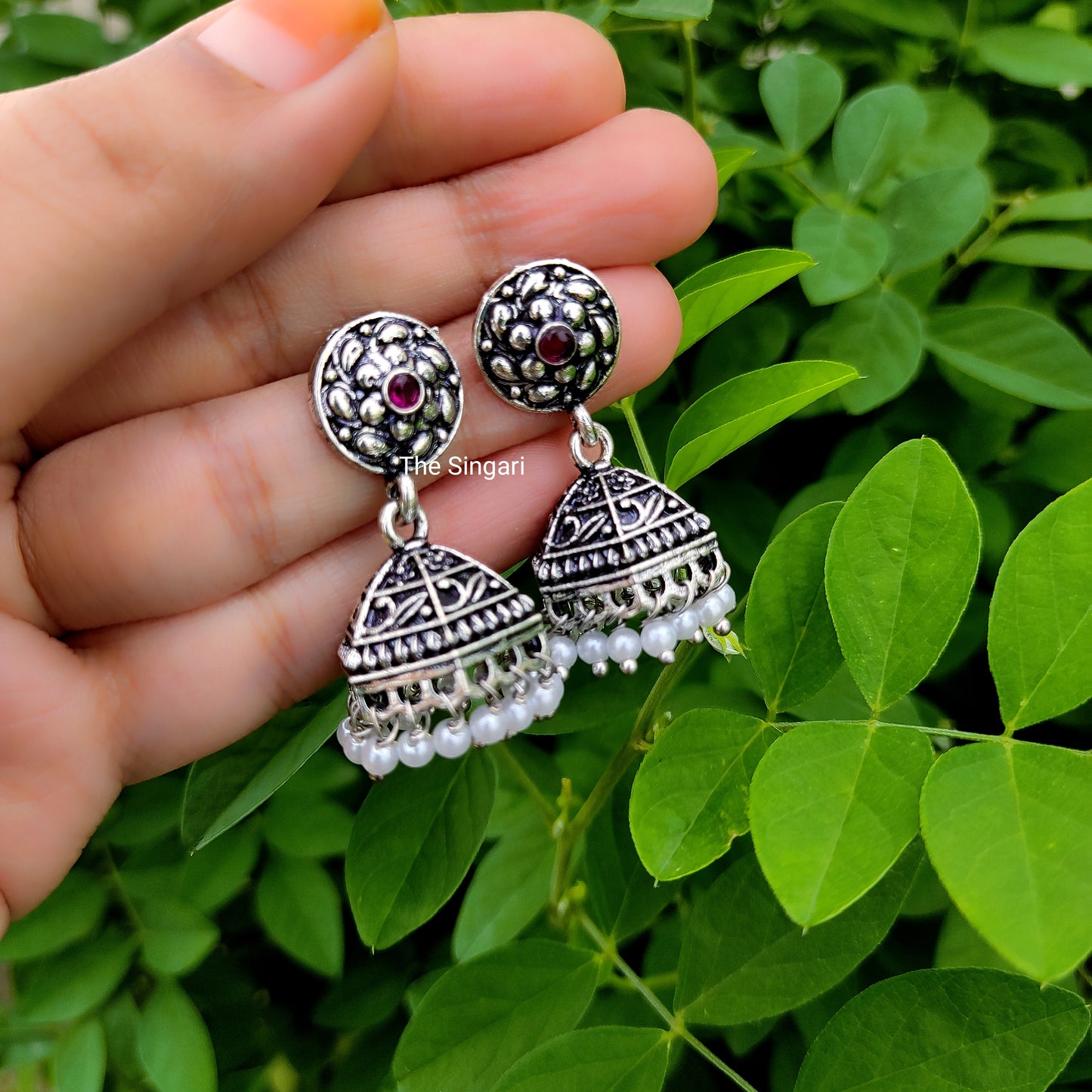 Pink stone oxidised jhumki earrings
