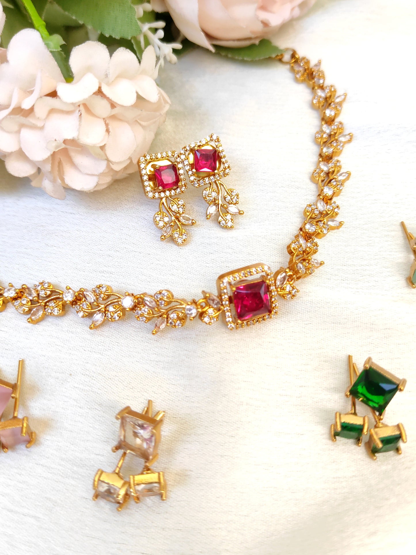 Colourful necklace with Interchangeable 5-Coloured cubic zirconia stones.( Red, Green, Mint, baby pink, white)