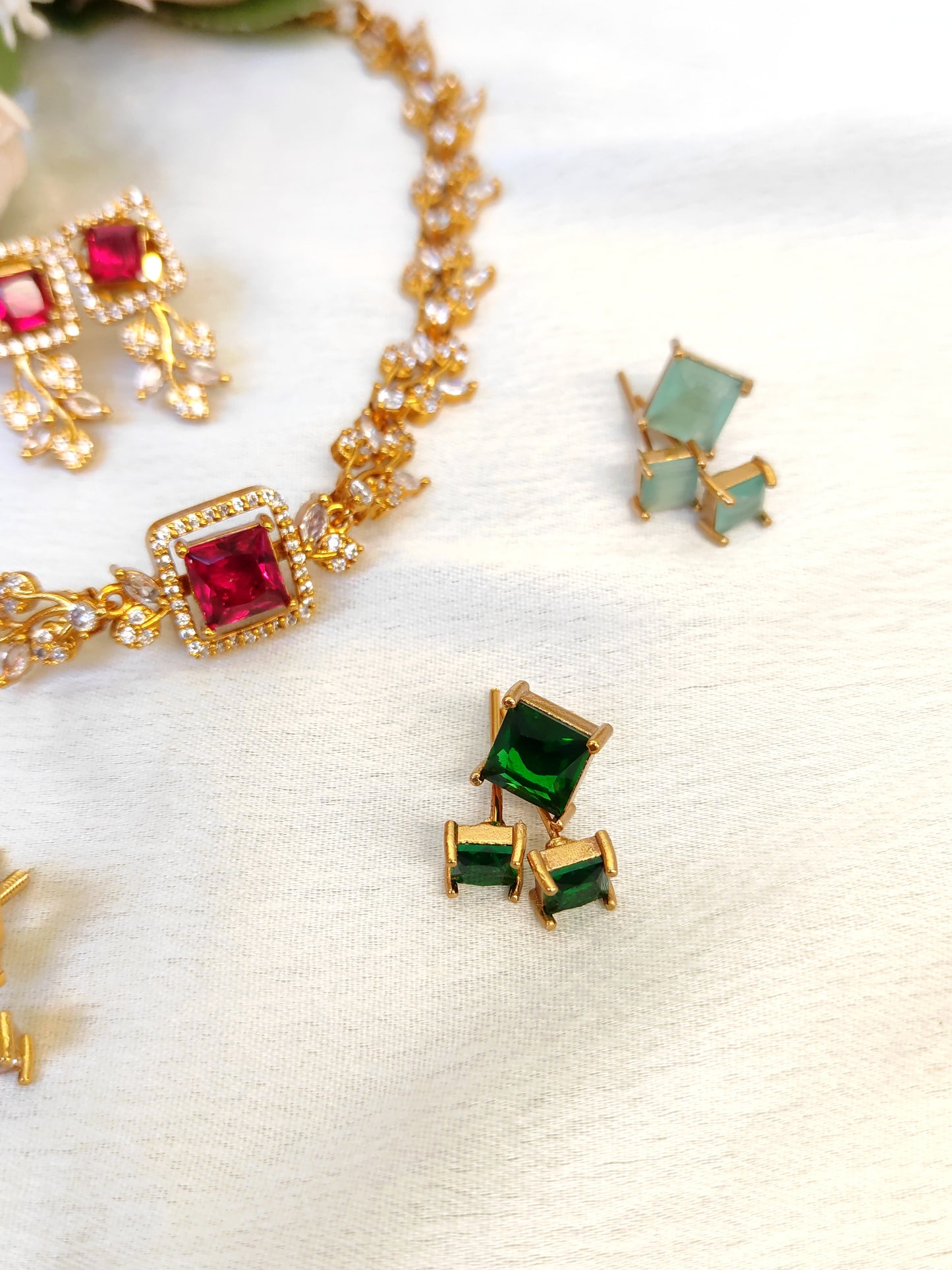 Colourful necklace with Interchangeable 5-Coloured cubic zirconia stones.( Red, Green, Mint, baby pink, white)