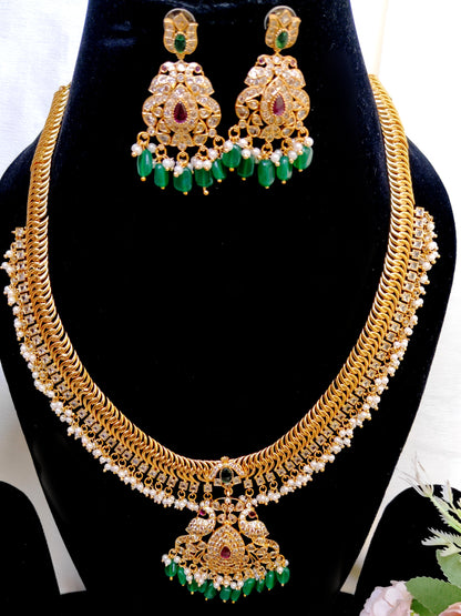 Jilebi Necklace Set with Kundan Work & Green Drops