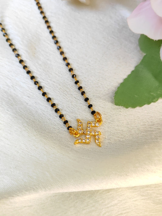 Black beads - Swastik